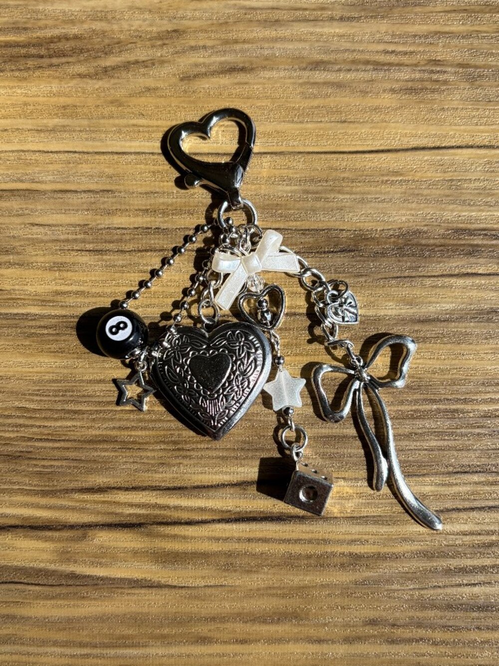 bag charm with locekt 8 ball charms silver and black